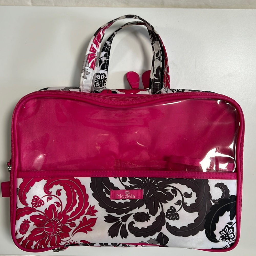 Gently used make-up bag.  Holds lots of items. H 8.5” x L 12” x W 3’